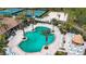 Community pool and surrounding amenities viewed from above at 11458 Saffron Ct, Venice, FL 34292