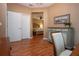 View down hallway showcasing access to bedroom and bathroom at 11458 Saffron Ct, Venice, FL 34292