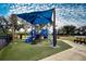 playground with shade canopy and play structures at 11458 Saffron Ct, Venice, FL 34292