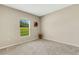 Empty bedroom featuring a window at 12977 Twin Bridges Dr, Riverview, FL 33579