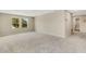 Large bonus room with a view of a bathroom at 12977 Twin Bridges Dr, Riverview, FL 33579