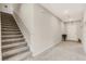 Modern staircase with carpeted steps and neutral wall colors at 12977 Twin Bridges Dr, Riverview, FL 33579