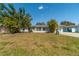 Front view of a single-story home with landscaping at 134 Rotonda Cir, Rotonda West, FL 33947