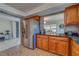 Kitchen features stainless steel appliances and wood cabinets at 134 Rotonda Cir, Rotonda West, FL 33947