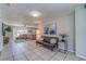 Living room with tile floors, comfortable seating and natural light at 134 Rotonda Cir, Rotonda West, FL 33947