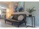 Living room with black couch and floor lamp at 134 Rotonda Cir, Rotonda West, FL 33947