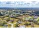 This aerial view showcases the property's location within a scenic residential community at 1573 Shadow Ridge Cir, Sarasota, FL 34240