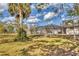 Spacious backyard featuring a pool and plenty of room for outdoor activities at 1573 Shadow Ridge Cir, Sarasota, FL 34240