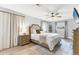 Serene main bedroom featuring a comfortable bed, soft lighting, and a calming color palette at 1573 Shadow Ridge Cir, Sarasota, FL 34240