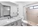 Clean bathroom with marble vanity and shower at 2037 Linwood Way, Sarasota, FL 34232