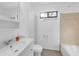 Clean bathroom with a shower/tub combo and white vanity at 2037 Linwood Way, Sarasota, FL 34232