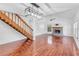 Bright dining room with hardwood floors and modern light fixture at 2037 Linwood Way, Sarasota, FL 34232