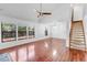 Open concept dining area with hardwood floors and a staircase at 2037 Linwood Way, Sarasota, FL 34232