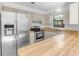 Kitchen with stainless steel appliances and wood countertops at 2037 Linwood Way, Sarasota, FL 34232