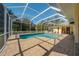 Inviting screened pool and patio area at 207 Santarem Cir, Punta Gorda, FL 33983