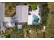 Bird's eye view of home with pool and lush landscaping at 2207 22Nd W St, Bradenton, FL 34205