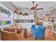 Bright living room with comfy seating and a view into the kitchen at 2207 22Nd W St, Bradenton, FL 34205