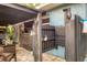 Private outdoor shower with wooden enclosure at 2207 22Nd W St, Bradenton, FL 34205