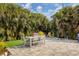 Spacious patio with seating area, lush landscaping at 2207 22Nd W St, Bradenton, FL 34205