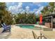 Refreshing pool with surrounding patio and seating at 2207 22Nd W St, Bradenton, FL 34205