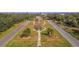 Aerial view of a community entrance with landscaping at 2459 Franciscan Dr # 5, Clearwater, FL 33763