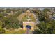 Aerial view of a community entrance with a large globe at 2459 Franciscan Dr # 5, Clearwater, FL 33763