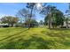 Expansive green lawn area in a residential community at 2459 Franciscan Dr # 5, Clearwater, FL 33763