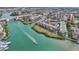 Aerial view showcasing condo location near waterways and bridges at 250 Santa Maria St # 120, Venice, FL 34285