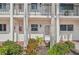 Condo entrance with landscaping and building exterior visible at 250 Santa Maria St # 120, Venice, FL 34285