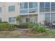 Landscaped patio with seating area and water views at 250 Santa Maria St # 120, Venice, FL 34285