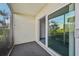 Screened patio with sliding doors and water views at 250 Santa Maria St # 120, Venice, FL 34285