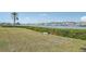 Scenic waterfront view with a bench and boats at 250 Santa Maria St # 120, Venice, FL 34285