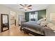 King bedroom with en-suite bathroom access and ample closet space at 2551 Morrietta Ln, North Port, FL 34286