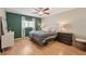 Spacious bedroom with king-size bed and en-suite bathroom at 2551 Morrietta Ln, North Port, FL 34286