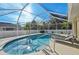 Inviting screened pool with lounge chairs and plenty of sunshine at 2551 Morrietta Ln, North Port, FL 34286