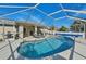 Relaxing screened pool and patio area, perfect for entertaining at 2551 Morrietta Ln, North Port, FL 34286