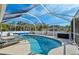 Enjoy this refreshing pool and spacious screened enclosure at 2551 Morrietta Ln, North Port, FL 34286