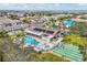 Community overview showcasing pool, shuffleboard, and homes at 2728 71St Street W Ct # 2078, Bradenton, FL 34209