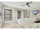 Main bedroom with access to a balcony and natural light at 2728 71St Street W Ct # 2078, Bradenton, FL 34209