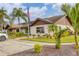 Country Village clubhouse, showcasing its architectural style and landscaping at 2728 71St Street W Ct # 2078, Bradenton, FL 34209