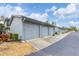 Row of attached garages with gray siding at 2728 71St Street W Ct # 2078, Bradenton, FL 34209