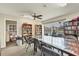 Quiet library with a glass-top table and ample bookshelves at 2728 71St Street W Ct # 2078, Bradenton, FL 34209