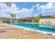 Refreshing community pool with lounge chairs and patio area at 2728 71St Street W Ct # 2078, Bradenton, FL 34209