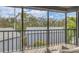 Relaxing screened balcony overlooking trees and neighboring buildings at 2728 71St Street W Ct # 2078, Bradenton, FL 34209