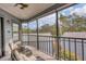 Relaxing screened porch with outdoor seating and scenic views at 2728 71St Street W Ct # 2078, Bradenton, FL 34209