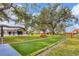 Relaxing shuffleboard court nestled under shade trees at 2728 71St Street W Ct # 2078, Bradenton, FL 34209