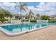 Sparkling community pool surrounded by lush landscaping at 2728 71St Street W Ct # 2078, Bradenton, FL 34209