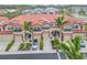 Aerial view of townhouses with attached garages and landscaping at 284 Crew Ct, Sarasota, FL 34243