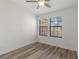 Bright bedroom featuring hardwood floors and large windows at 284 Crew Ct, Sarasota, FL 34243