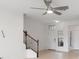 Bright entryway with staircase and ceiling fan at 284 Crew Ct, Sarasota, FL 34243